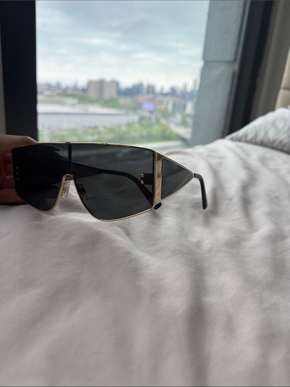 Dolce & Gabbana Gold Frame Sunglasses with Black Lenses